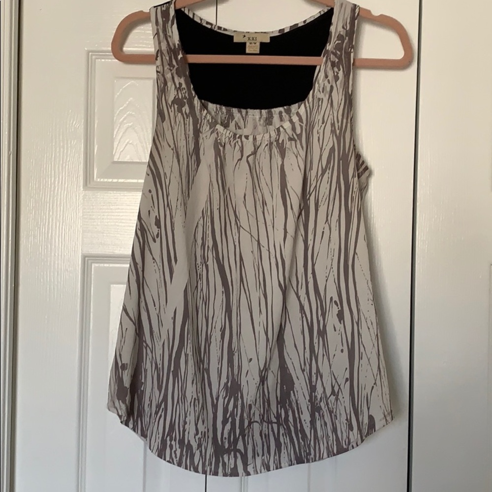 Sleeveless flowing, blouse